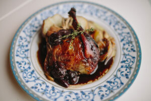 roasted duck confit with sweet cherry demi glace